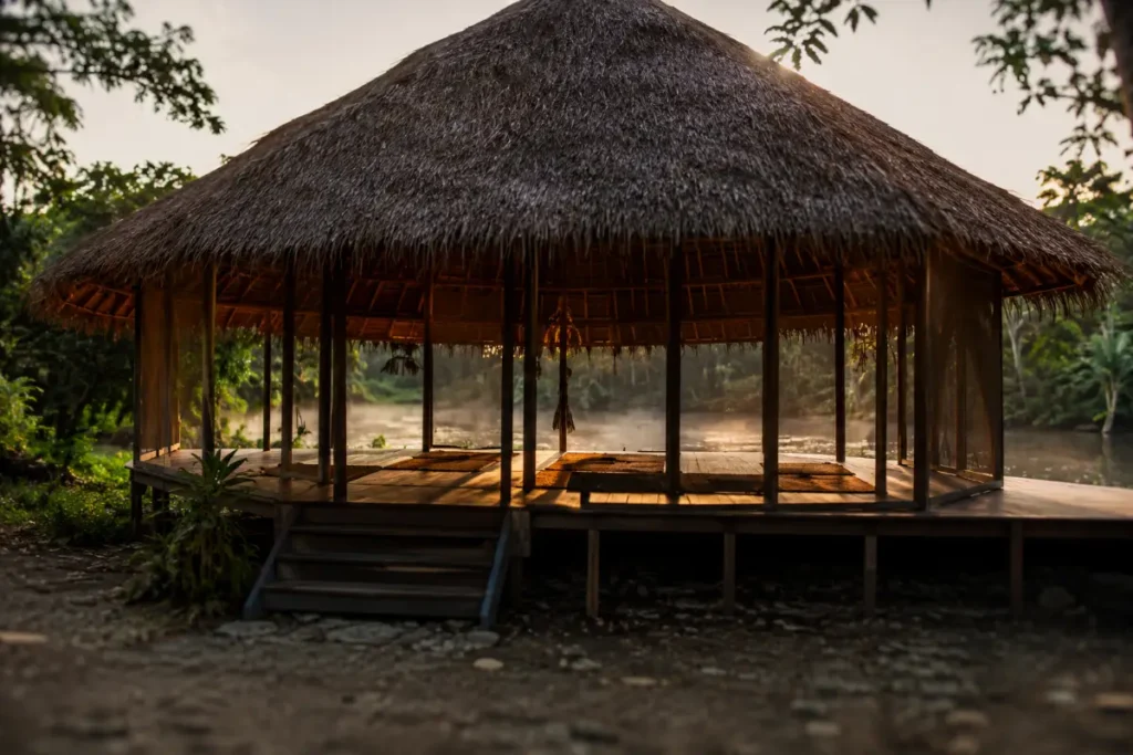 Octagonal maloca at dawn where ayahuasca ceremonies are held on the Rio Momon, Iquitos
