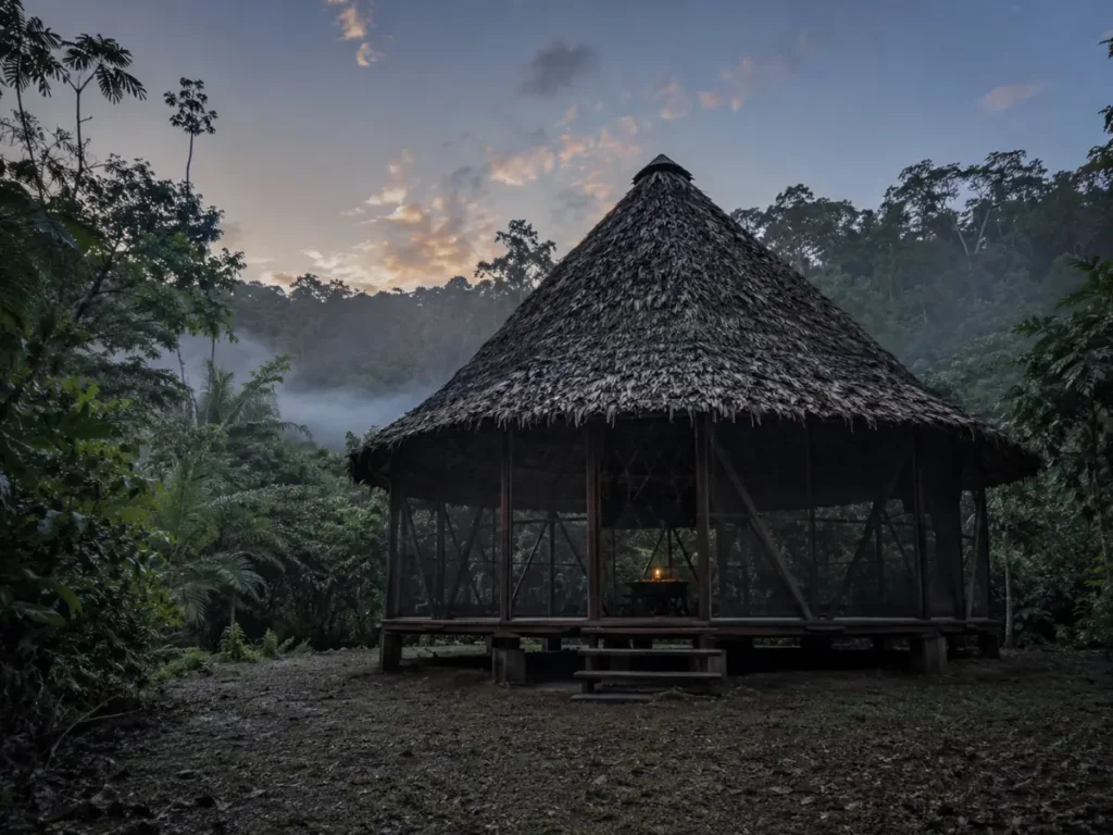 Octagonal maloca at dawn on the Rio Momon, Iquitos ayahuasca retreat