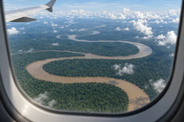 Amazon river and rainforest from a plane window near Iquitos, a city no road links to the rest of Peru